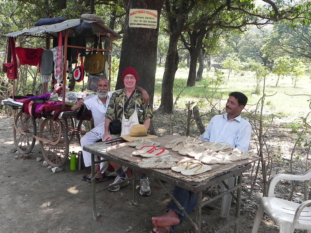  Mike sitting with the Rishikesh vendor who made his new hat. 