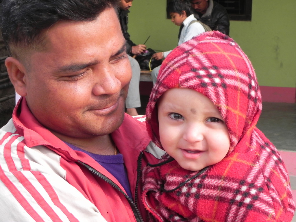 A father and child in Lumbini town.