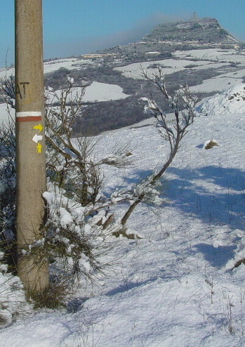 The signs point the way even in the snow. Looking back towards Santiago.